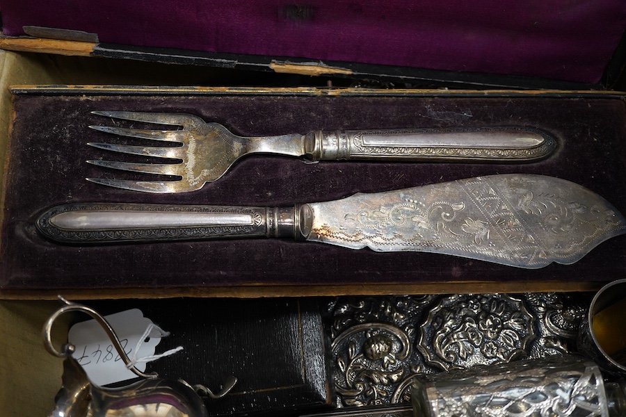 A group of small silver and white metal items including a late Victorian silver cream jug, a late Victorian silver mounted hand mirror, two continental 900 standard mounted small wall mirrors, a modern miniature silver t